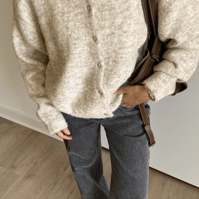 Vintage lysegrå strikvest med muslingeknapper