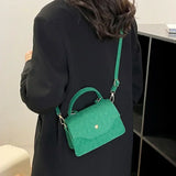 Blå crossbody-taske i koreansk stil under armene