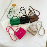 Blå crossbody-taske i koreansk stil under armene