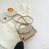 Blå crossbody-taske i koreansk stil under armene