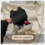 Mini skinnende læder crossbody-taske