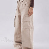 Elegante og løstsiddende grønne boyfriend jeans med knapper