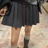 Plisseret mini-nederdel i strik