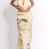 Sexet printet maxinederdelsæt med tætsiddende ryg og åben ryg