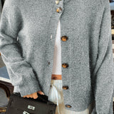 Minimalistisk cardigan med lange ærmer og knapper