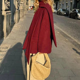 Uldfrakke med tørklædekrave og enkeltradede knapper