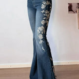 Vintage bootcut jeans med plantebroderi