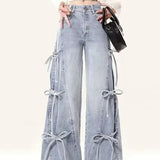 Vintage jeans med vide ben og butterfly