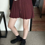 Plisseret mini-nederdel i strik