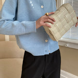 Raglanvest med jadeknapper