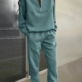 Damesæt i to dele – Blød strik – Afslappet pasform – Langærmet top med lynlås og smalle bukser