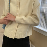 Raglanvest med jadeknapper