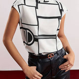 Holli - ærmeløs bluse med rund hals