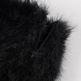 Kort, tætsiddende nederdel med et farverigt og luftigt dyreprint