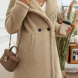 Mellemlang frakke med luftige reverser