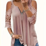 Lotte - Bluse med lynlåslukning og usædvanlige skuldre