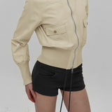 Afslappet jakke med lynlåslomme, opretstående krave og tætsiddende talje