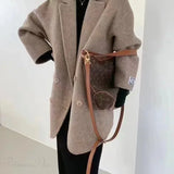 Uldfrakke med kashmirrevers