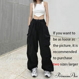 Afslappede joggingbukser med vide ben og lommer, lige snit.