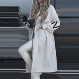 Lang afslappet frakke med snørebånd og patchwork