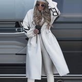 Lang afslappet frakke med snørebånd og patchwork