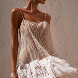 Rygløs aftenkjole med frynser og pailletter