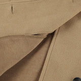 Frakke i uldblanding med flagermusærmer