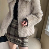 Højtaljet nederdel med farveblok og ternet mønster