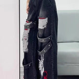 Mørke jeans med vide ben og svajer