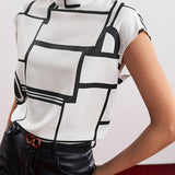 Holli - ærmeløs bluse med rund hals