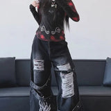 Mørke jeans med vide ben og svajer