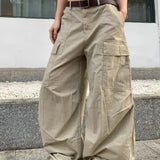 Løstsiddende cargobukser med store, buede lommer