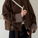 Uldfrakke med opretstående krave og ternede paneler, korte manchetter