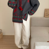 Oversized vest med pomponer