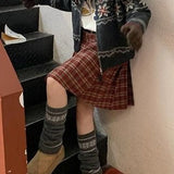 Ternet plisseret nederdel i uld