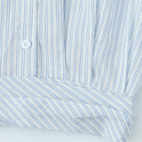 Sæt med stribet langærmet skjorte og højtaljet miniskørt med bindebånd foran