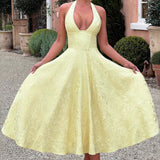 Jacquard aftenkjole med åben ryg og V-hals