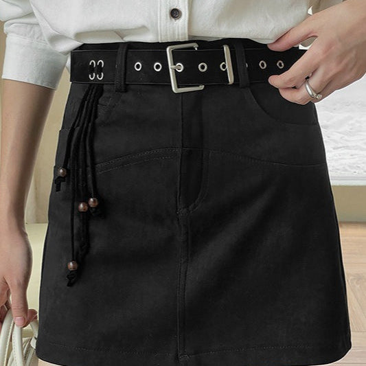 Kort A-formet nederdel med frynset talje