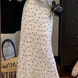 Højtaljet havfrue-nederdel med blomsterprint i plus size