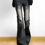 Vintage jeans med svaj og botanisk print