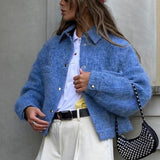 Blå uldjakke med lange ærmer