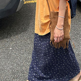 Afslappet marineblå nederdel med blomsterprint og snøre