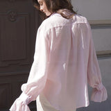 Langærmet bluse med knapper foran i Tencel