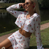 Todelt sæt: cardigan og langærmet nederdel i trykt satin