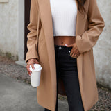 Lang, ensfarvet frakke i uldblanding