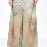 tie-dye denimjeans med vide ben og løstsiddende pasform