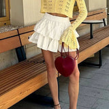 Langærmet vest i åbent strik med V-hals