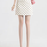 Trapeznederdel med polkaprikker