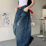 Casual utility jeans med vide, buede ben og en slidt look