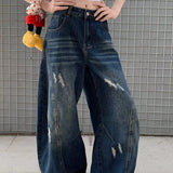 Casual utility jeans med vide, buede ben og en slidt look